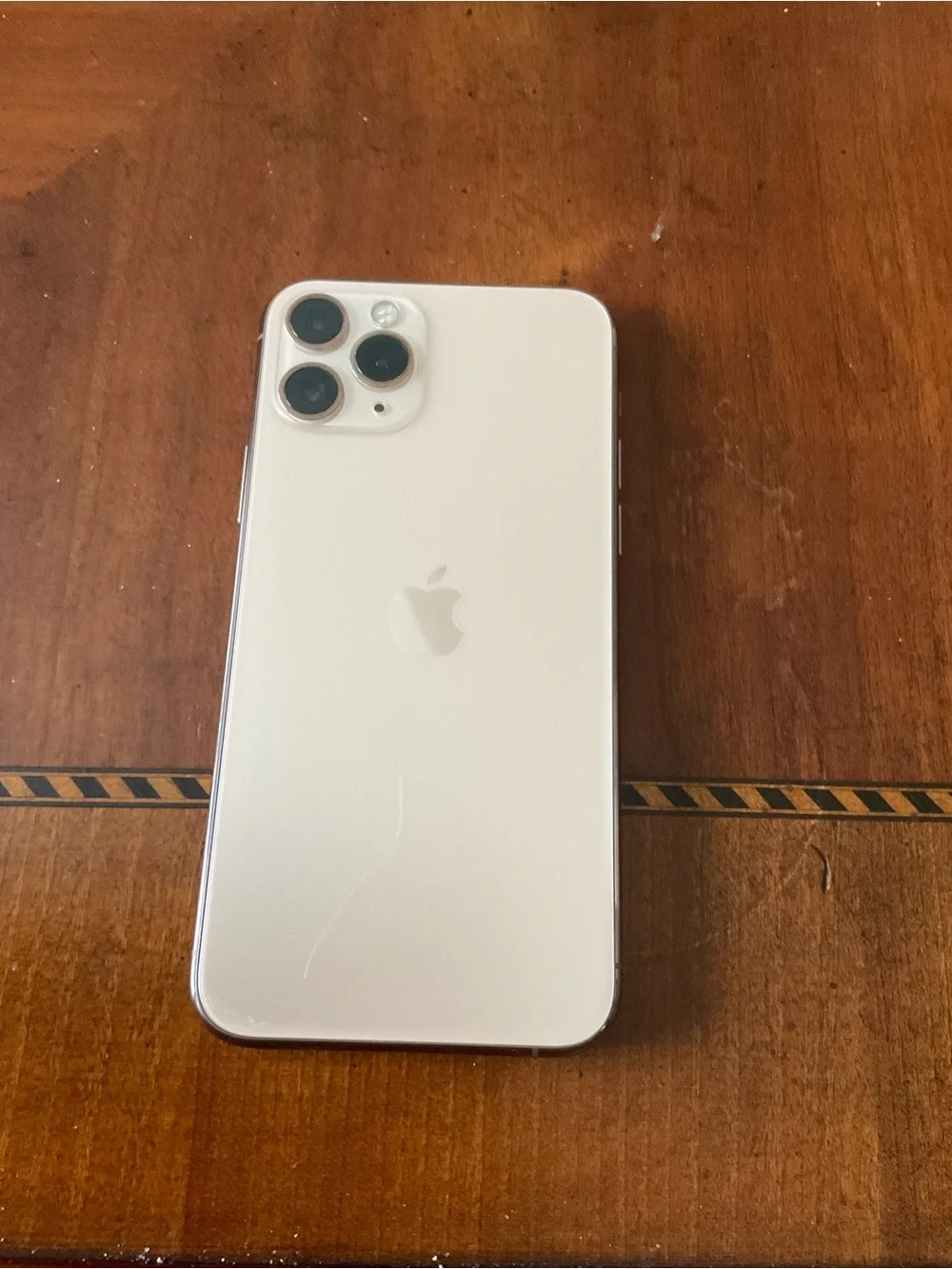 Apple iPhone 11 Pro - Silver/White Finish. Charging cord. In original box.